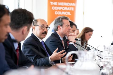 Business and government leaders in a Meridian roundtable