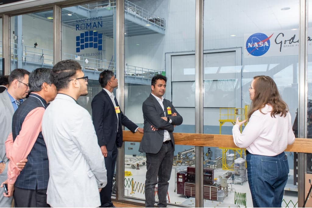 An international delegation tours a NASA facility